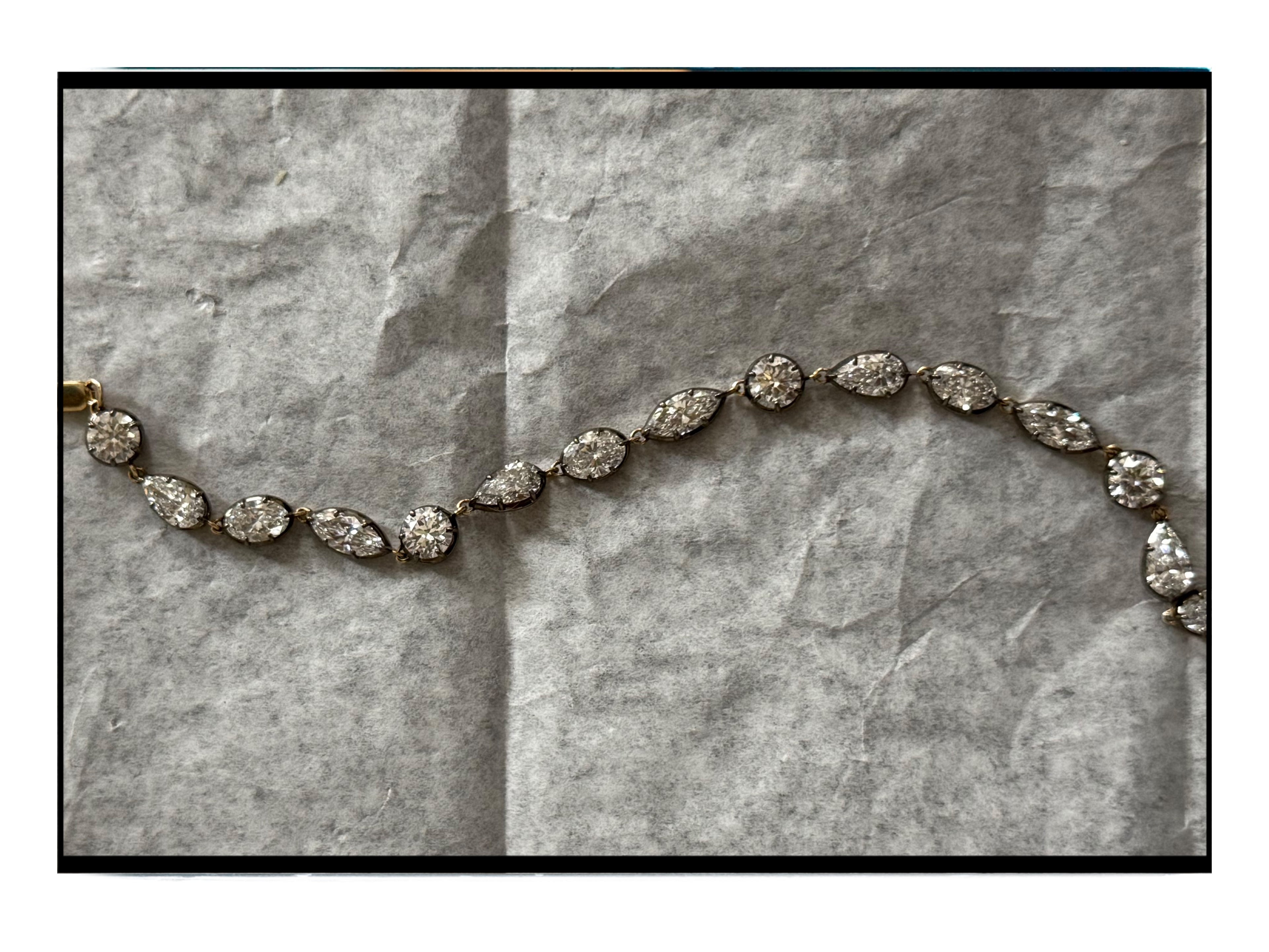 Diamond necklace on a textured gray surface